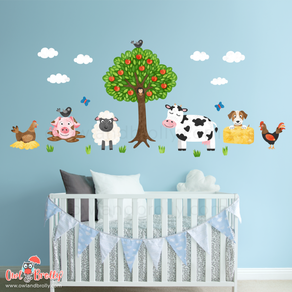 Small farmyard fabric wall sticker nursery wall art scene from Owl and Brolly. Farm animals including cow, sheep, pig, hen, cockerel, puppy and apple tree. An ideal set to go above children's bedroom furniture.